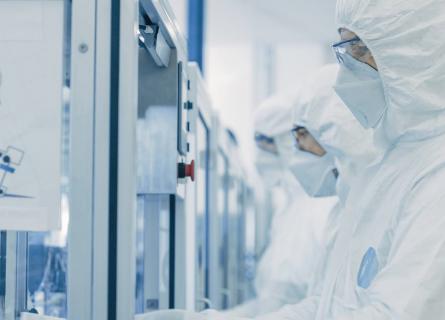 A photo of laboratory staff in a medical production facility