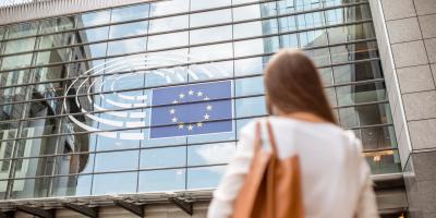 Woman standing in front of the EU parliament