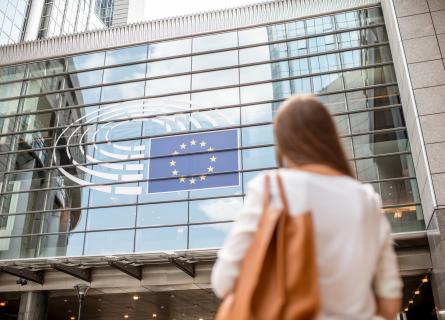 Woman standing in front of the EU parliament